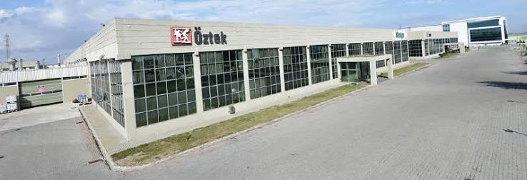 Öztek Tekstil Fabrikasi Logo
